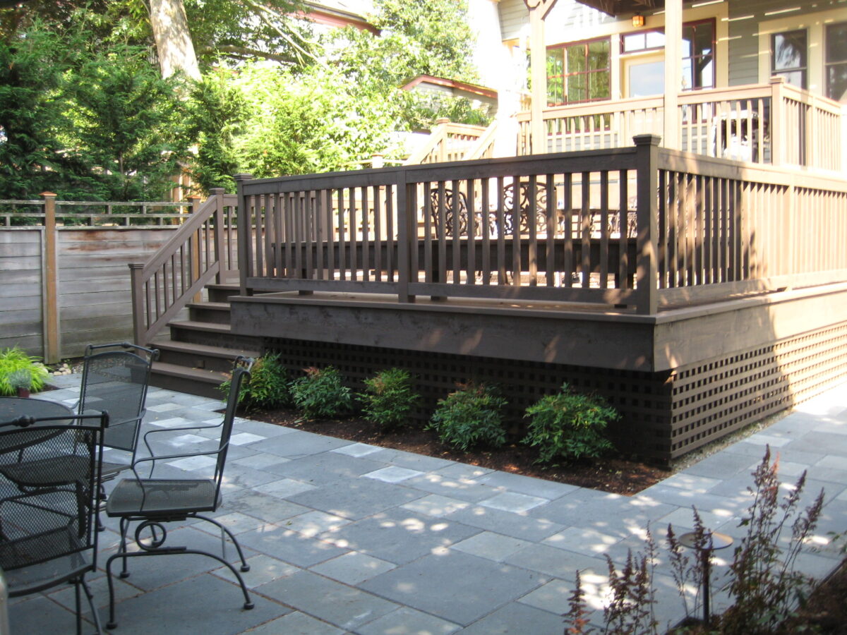Seen here is a multi-level custom dark wood stained deck created by Lifestyle Landscapes in Seattle, Washington.