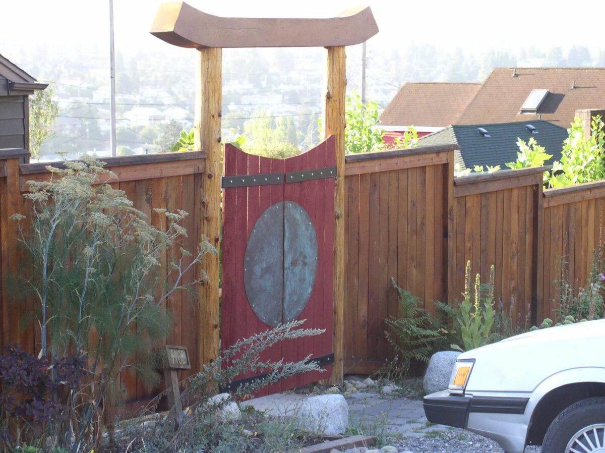 Custom asian-inspired fence gate and custom fencing built for a residence in the city of Seattle.