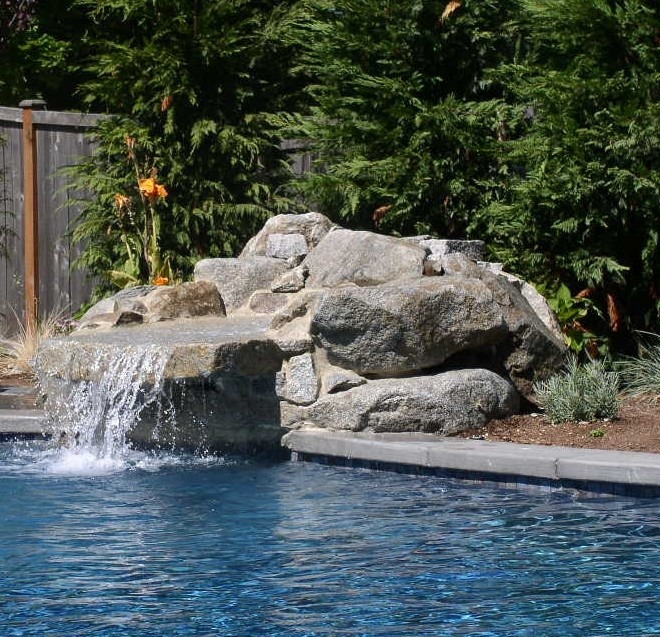 Rock Waterfall Fountain in Seattle backyard